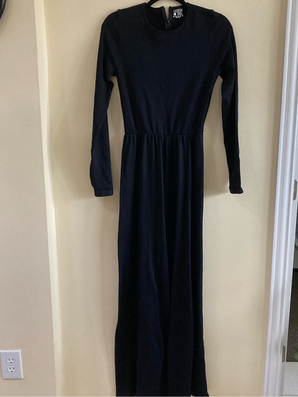 Long Black Long-Sleeve jumpsuit.